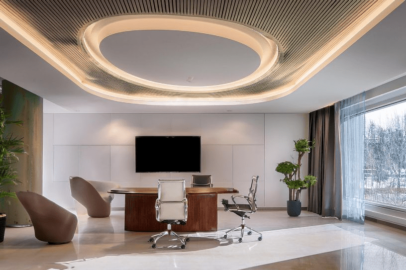 Mẫu trần thạch cao cho phòng làm việc giám đốc với ô trần hắt sáng hình oval, sang trọng và hiện đại