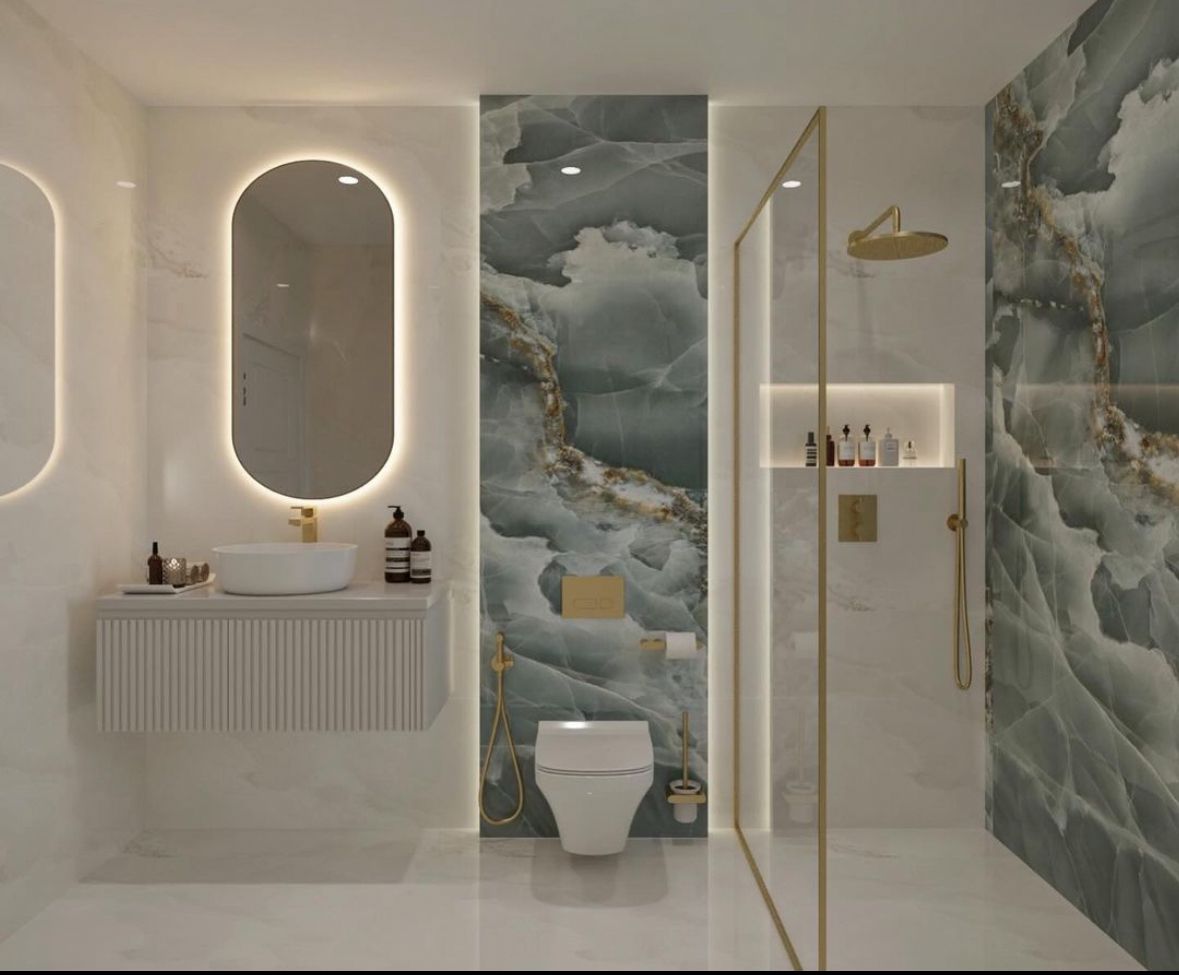Nhà vệ sinh đá marble xanh với trần thạch cao